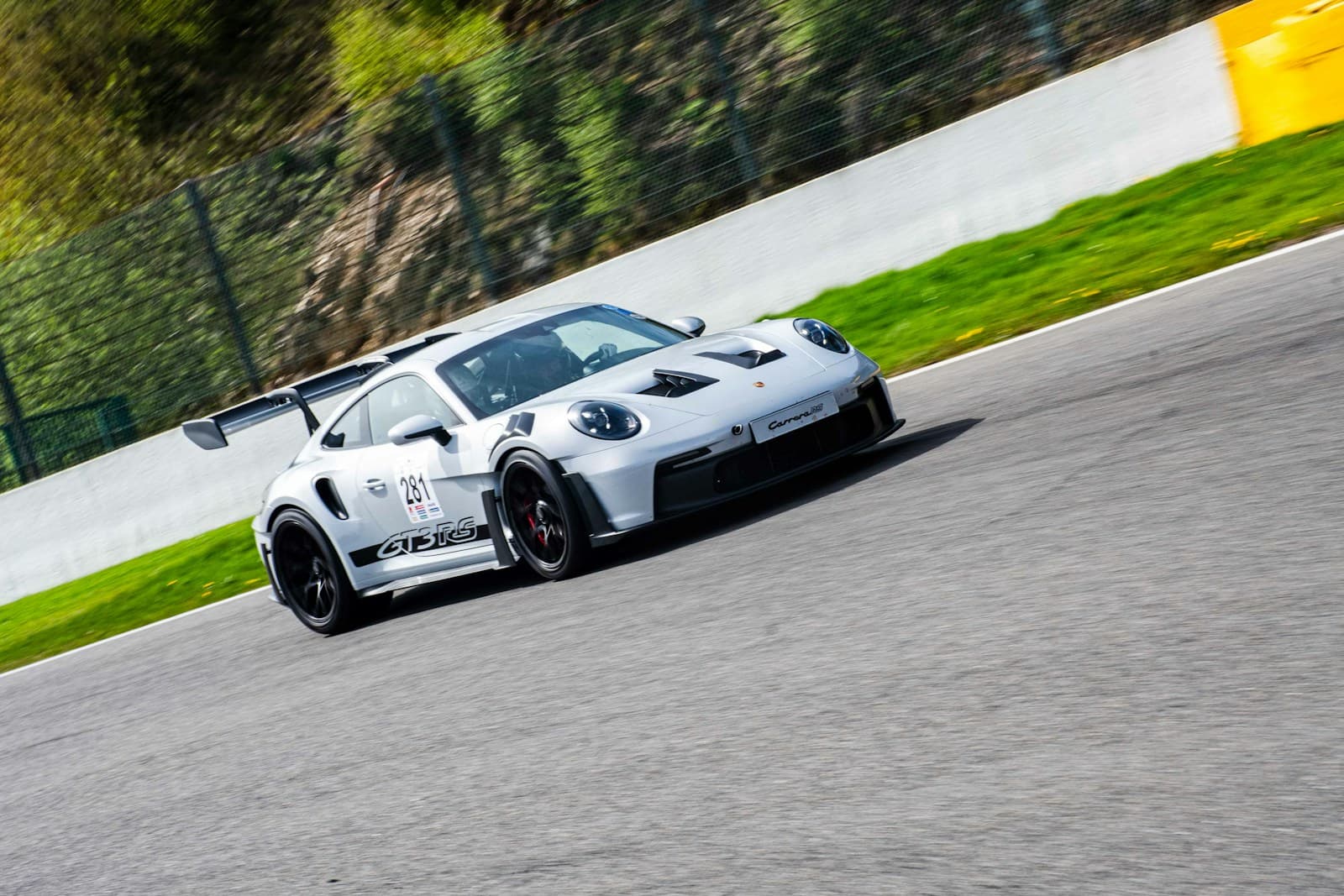 Sports car cornering at speed